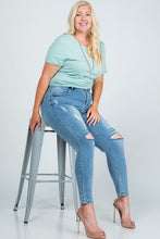 Load image into Gallery viewer, Mid Rise Distressed Skinny Jeans

